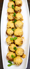 Stuffed Mushrooms with Baked Shrimp: A Hot Banquet Appetizer. High quality photo