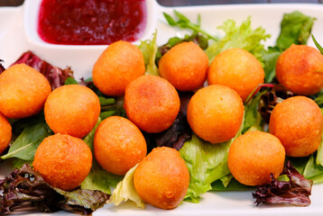 Close up Cheese balls on white dish,top view. High quality photo