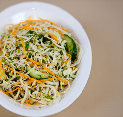 fresh vegetables salad with cabbage and carrot. Cabbage carrot cucumber