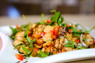 Pickled honey mushrooms close-up. Canned mushrooms in marinade. High quality photo