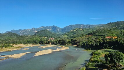 Rural Mountain River Valley View Low Water in laos landscape. Vibrant natural laos landscape...