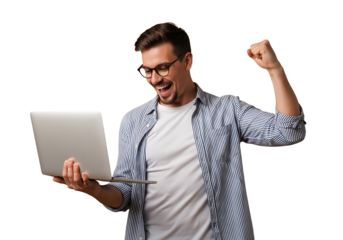 Triumphant young man celebrates digital success with a laptop, fist-pumping in joy. Casual striped shirt and glasses frame his ecstatic expression. Perfect for tech wins, online achievements, or happy