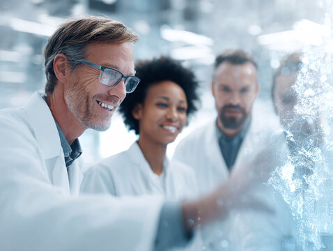 Diverse scientists collaborating, analyzing data on screen. Teamwork in lab. Innovation, research, discovery. Great for science, tech, healthcare themes. - Powered by Adobe