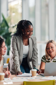 Diverse business team collaborating during office meeting