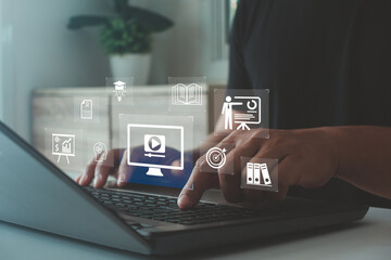 Businessman joining lesson and webinar on laptop with digital virtual screen. Showcasing education technology, learning and professional knowledge growth. E-learning and online education concept.