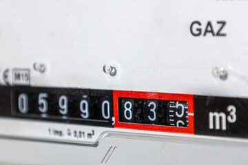 External natural gas meter in the house, gas heating.
