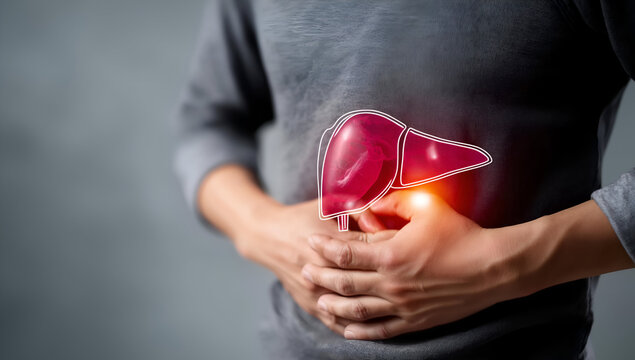 A person experiencing abdominal discomfort, highlighting the liver's importance in overall health and wellness.