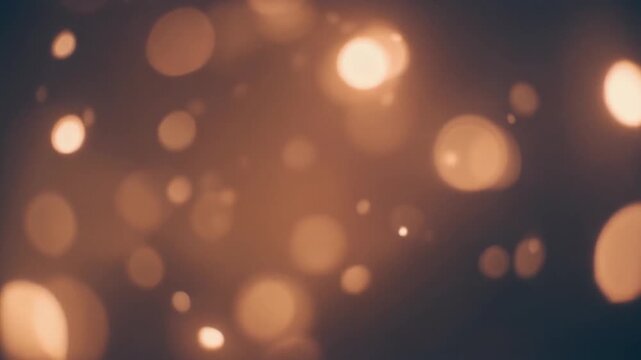Golden Christmas lights bokeh on a dark, snowy background for a bright holiday decoration
