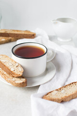 almond biscotti on a white plate, almond cantucci cookies on a white plate