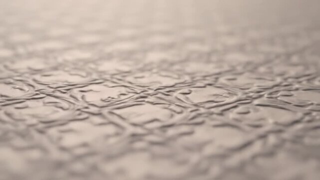 Close up of a textured surface with intricate patterns and details.