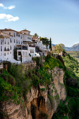 Obraz premium Ronda white village overlooking deep El Tajo gorge in Andalusia, Spain