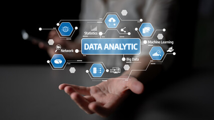 A hand extends with digital icons representing data analytics concepts, showcasing technology and statistics in a modern business setting. Tessel
