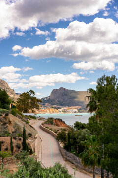 Altea coastline landscape with a winding road leading to the sea