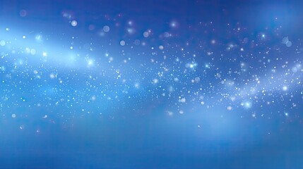 Obraz premium Beautiful blue abstract background with sparkling bokeh lights and soft gradients that create a serene and dreamy atmosphere for any design project