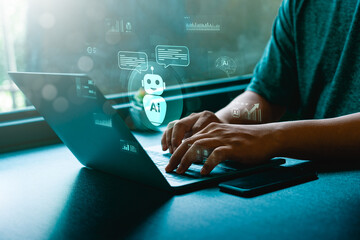 Artificial intelligence chatbot assistant on laptop computer with digital AI robot icon, virtual...