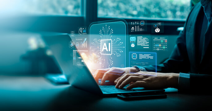 Artificial intelligence technology in business with businessman using laptop and virtual AI interface for data analysis, automation, decision support, innovation, and digital transformation concept