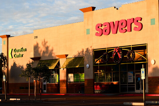 Savers thrift store exterior with branded signage, window displays, and donation center entrance, illustrating secondhand retail operations and reuse-focused consumer goods services