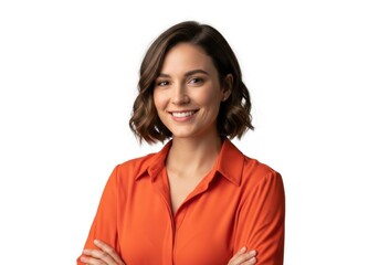 Cheerful young woman in orange shirt with arms crossed, smiling