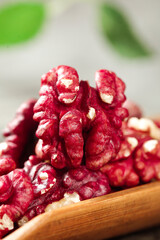 Fresh Red Xinjiang Walnuts in Wooden Bowl - Healthy Organic Nuts with Natural Skin Texture