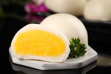 Golden Custard Filled Steamed Buns Traditional Dim Sum Breakfast Dessert on White Plate