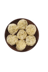 Asian Juice-Absorbing Noodle Nests in Wooden Bowl on White Background for Cold Refreshing Soups