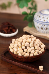 Raw Chickpeas in Wooden Bowl with Traditional Teapot - Healthy Legumes and Plant-Based Protein Ingredients