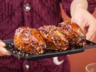 Chengdu Spicy Marinated Rabbit Head Traditional Sichuan Cuisine Delicacy with Sesame Seeds