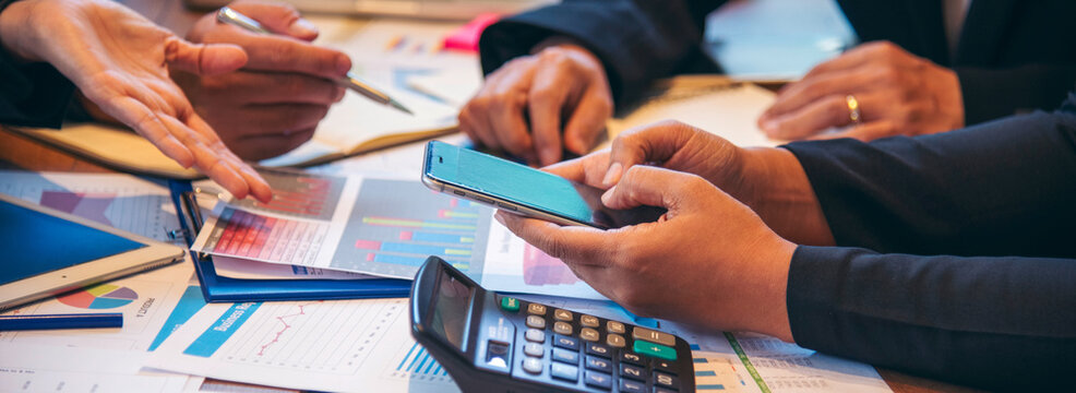 Banner Group of business people meeting in conference room. Panorama Asian businesspeople brainstorm teamwork partnership. Happy teams meeting graph chart business data meeting room with copy space