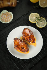 Glazed Roasted Meat with Lemon and Herbs on Cooling Rack - Home Cooking Food Photography