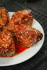 Spicy Stewed Rabbit Head Chengdu Shuangliu Style Traditional Sichuan Cuisine with Chili Oil and Sesame Seeds