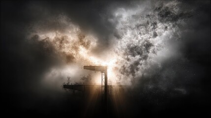 A stark, angular industrial structure, possibly a bridge or platform, silhouetted against a turbulent, dramatic sky filled with dark storm clouds illuminated by