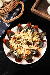 Fresh Steamed Mussels with Garlic and Herbs on Rustic Table Setting - Gourmet Seafood Dish