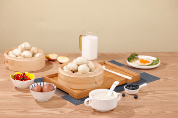 Delicious Chinese Dim Sum Breakfast with Xiao Long Bao Dumplings and Traditional Steamed Buns in Natural Light