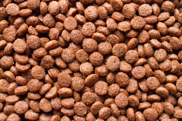 Texture of pelleted dry cat food. Dry food for pets