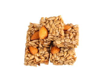 Handmade Nut Brittle Bars with Almonds and Seeds on White Background