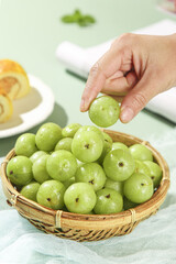 Fresh Green Gooseberries in Wicker Basket - Hand Picking Organic Fruit in Kitchen Still Life Photography