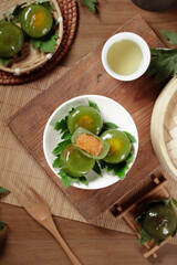 Traditional Chinese Green Dumplings with Tea for Qingming Festival Asian Cuisine