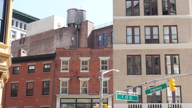New York City Broadway street sign on Manhattan, United States. Urban road sign in american city. Traffic sign in Midtown. Building architecture in ladies mile historic district near Union Square.