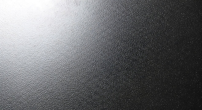 Textured dark gray surface with bright light reflection on left background - Powered by Adobe