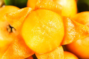 Fresh Loquat Fruit Slices from Panzhihua Sichuan China - Ripe Golden Orange Tropical Fruit Close-up