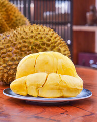 Fresh Golden Durian Fruit from Thailand - Shelled Tropical Fruit Segments on Plate