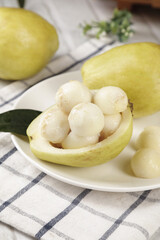 Fresh White Guava Heart Fruit from Guangxi China on Soft White Plate Picture Show