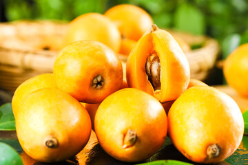 Fresh Yunnan Loquat Fruits in Wooden Basket - High Quality Asian Stone Fruit Photography
