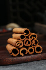 Natural Guangxi Cinnamon Bark Sticks Bundle Aromatic Cooking Spice Seasoning on Wood Board