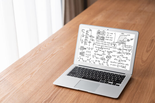 Mathematic equations and modish formula on computer screen showing concept of science and education
