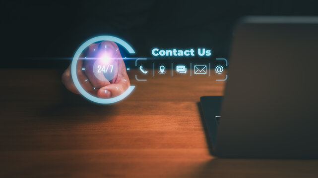 24/7 contact support concept featuring person touching a digital clock icon and communication symbols, representing customer service accessibility, hotline assistance, and online support solutions.