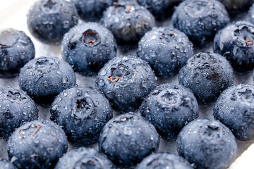 Fresh Yunnan King Blueberries with Water Droplets - Premium Imported Berry Superfood in White Bowl