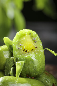 Fresh Kiwi Fruit Slices with Green Flesh and Seeds - Healthy Vitamin Rich Food