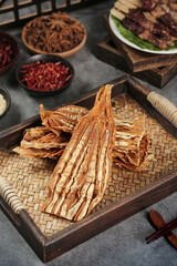 Huangshan Dried Bamboo Shoots with Traditional Chinese Spices on Bamboo Tray