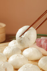 Handmade Pork Buns with Scallion and Chopsticks - Traditional Asian Dumplings